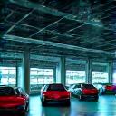 Warehouse with cars and a digital inventory overlay